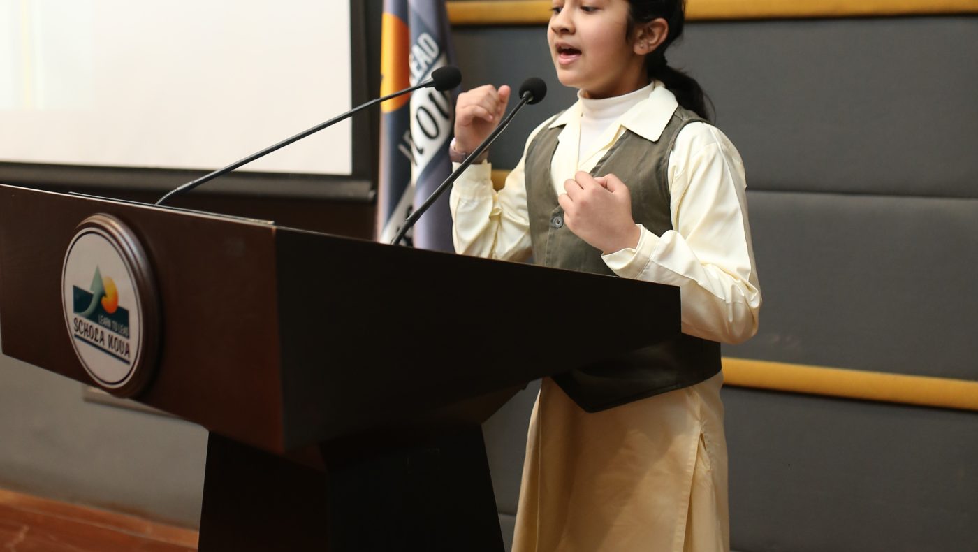 Students at Schola Nova participating in annual debates and character building activities